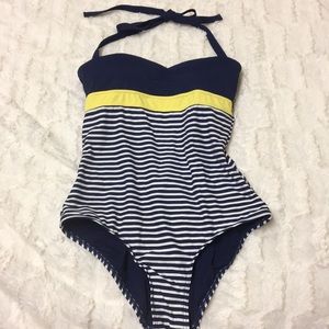White, blue and yellow one piece! Never worn